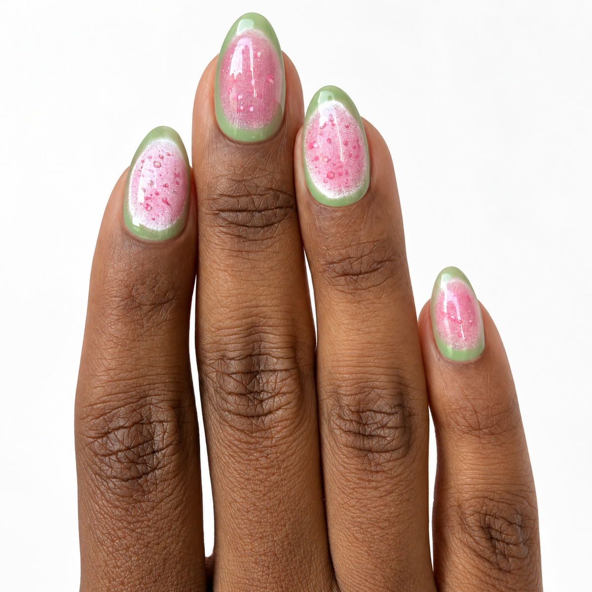 Baby Guava Fresh Set Studio press-on nails on hand