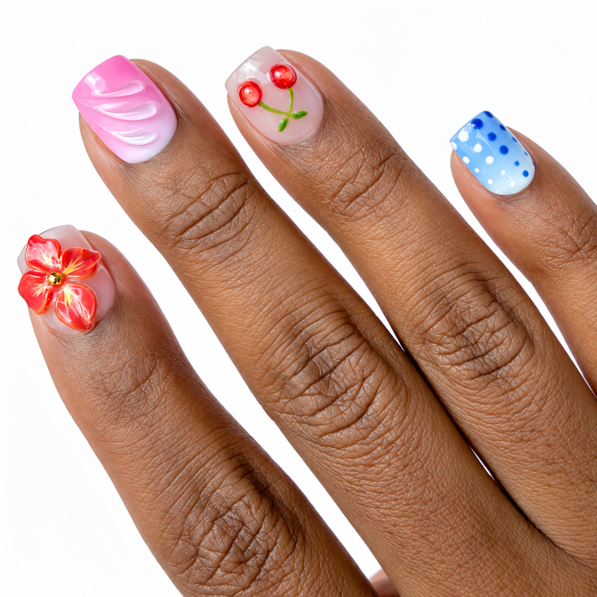 Rum Punch Fresh Set Studio press-on nails on hand