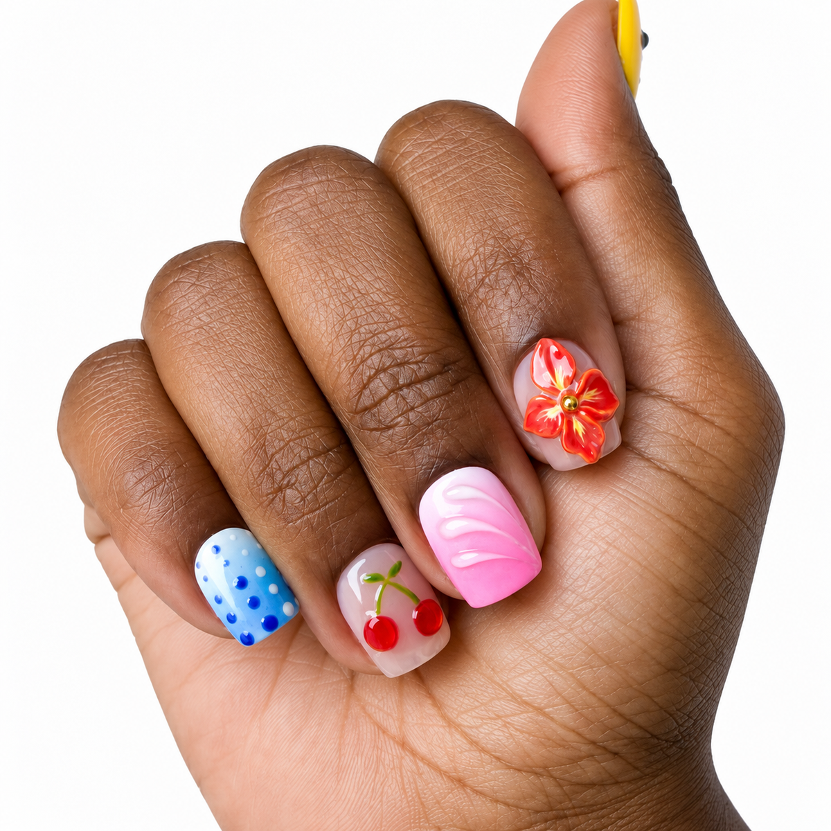 Rum Punch Fresh Set Studio press-on nails on hand