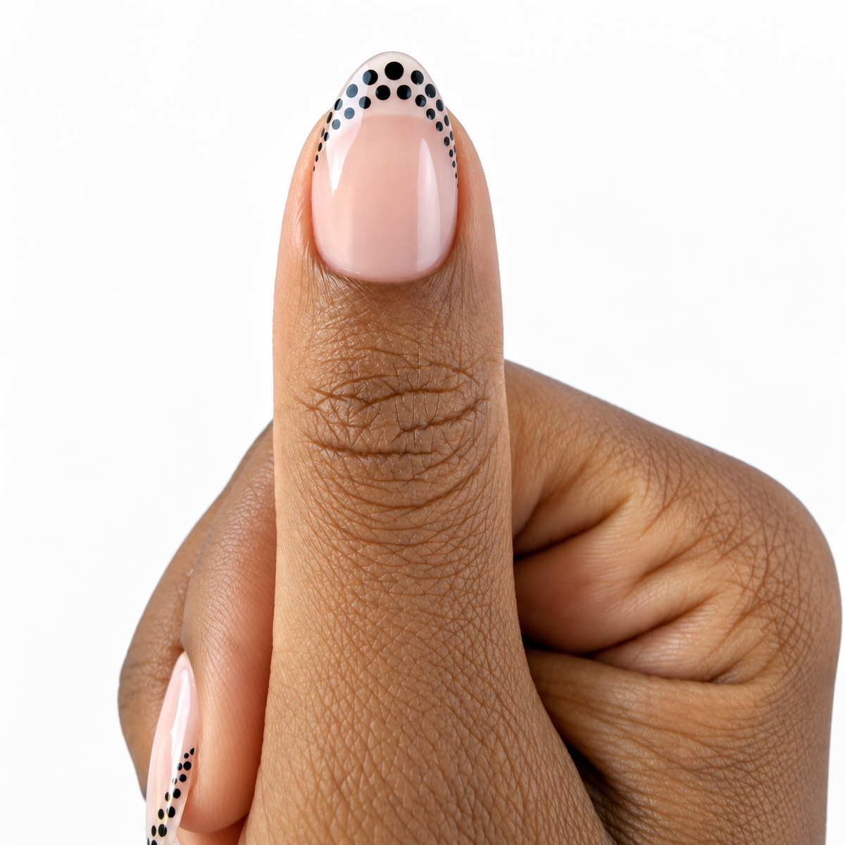 Dainty Dots Fresh Set Studio press-on nails on hand