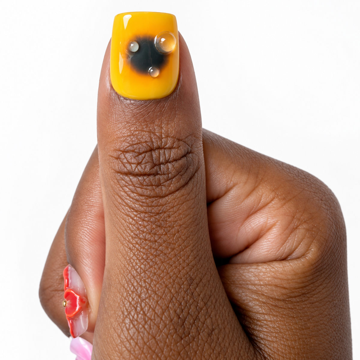 Rum Punch Fresh Set Studio press-on nails on hand