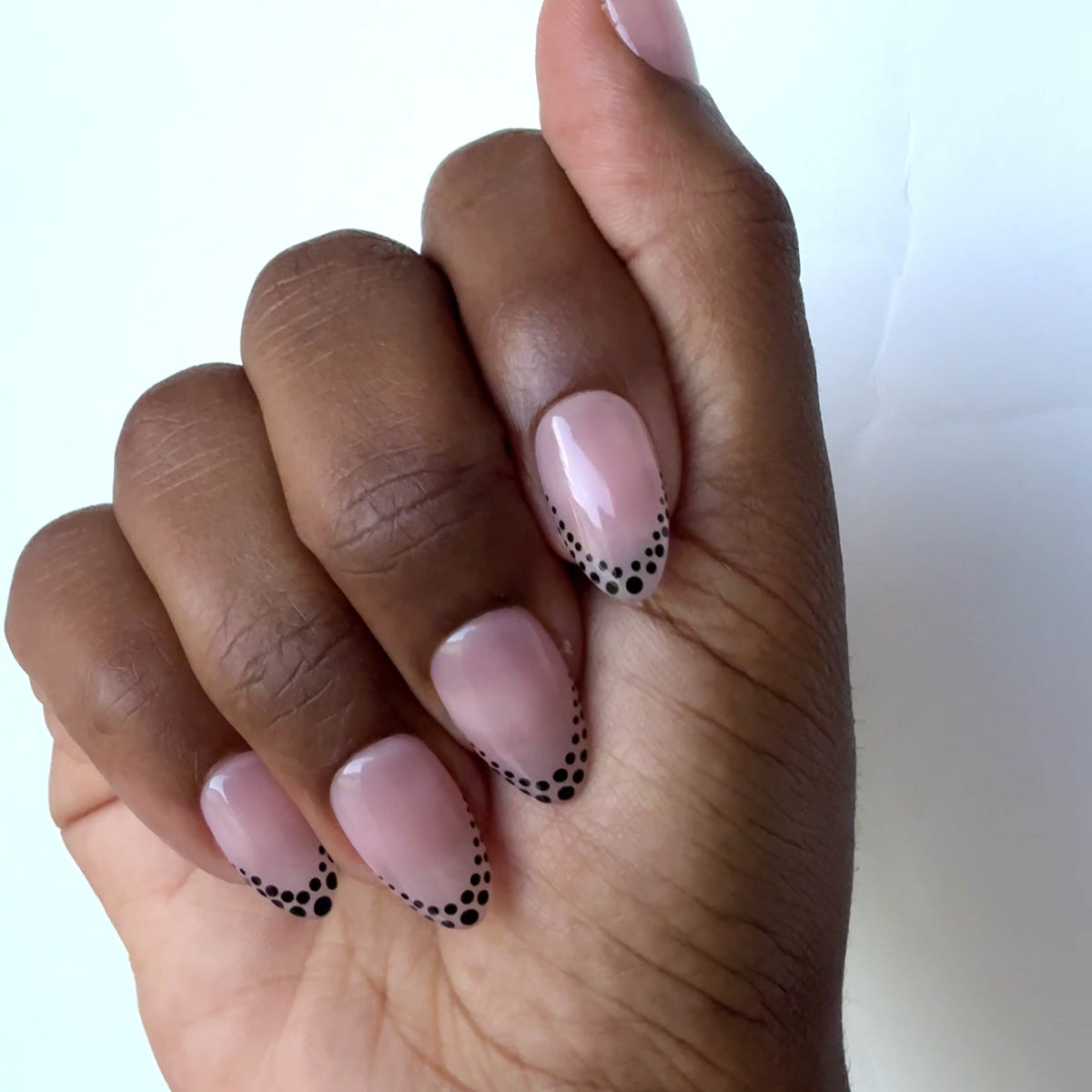 Dainty Dots press-on nails in motion
