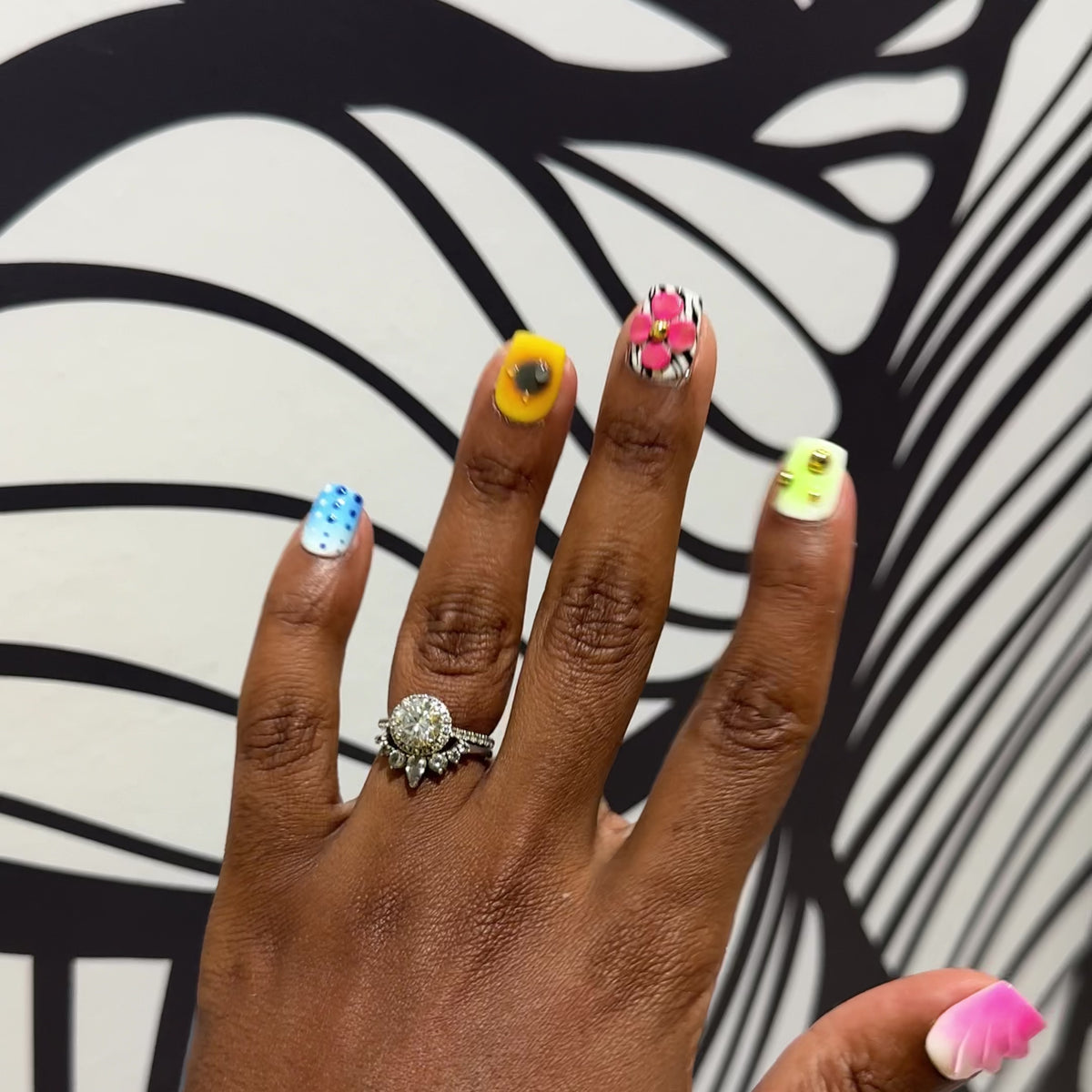 Rum Punch press-on nails in motion