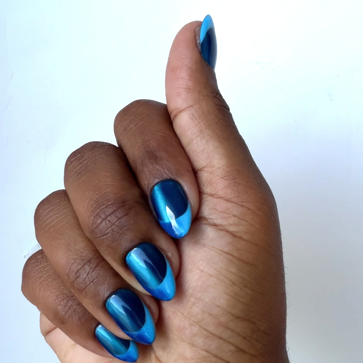 Blue Velvet press-on nails in motion